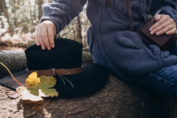 Girl Sits Tree Forest Holding Hat Autumn Leaves — Stock Photo, Image