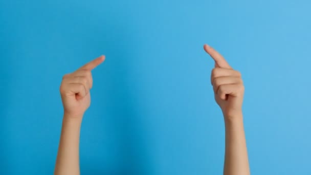 Woman Hands Indicate Forefinger Blank Copy Space Blue Background Body — Stock Video