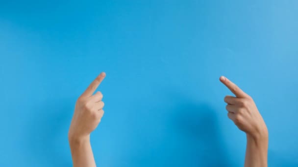 Female Hands Pointing Copyspace Isolated Blue Background Studio Body Language — Stock Video