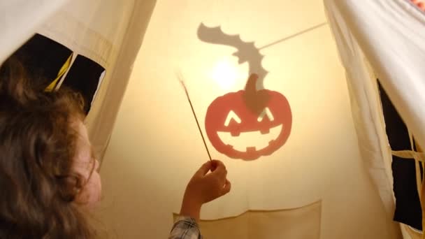 Close Cute Little Girl Unrecognizable Mother Playing Carved Paper Bats — Stock Video