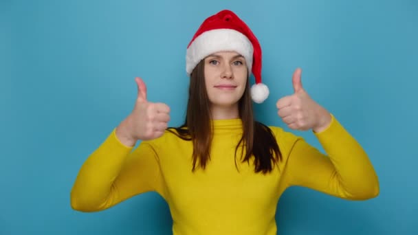 Cheerful Cute Young Woman Yellow Cozy Sweater Red Santa Christmas — Stock Video