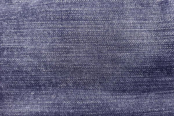 Abstrato velho jeans azul jeans textura, Close-up superfície até o fundo de fibra . — Fotografia de Stock