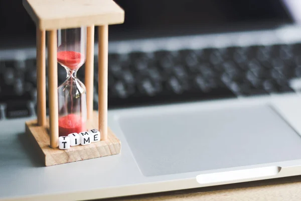 sand clock timer on laptop with \