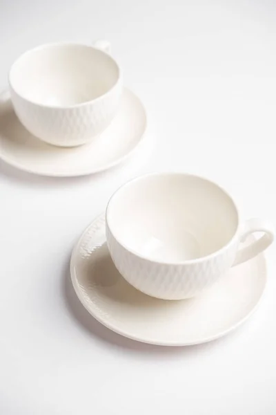 Tasses à café vides sur fond blanc — Photo