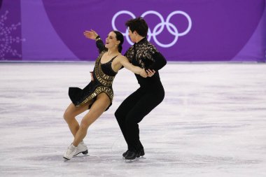 Tarihleri, Güney Kore - 11 Şubat 2018: İki kez Olimpiyat şampiyonu takım olay buz dansı kısa dans 2018 Kış Olimpiyat Oyunları'nda Tessa Virtue ve Scott Moir Kanada gerçekleştirilebileceğinizi