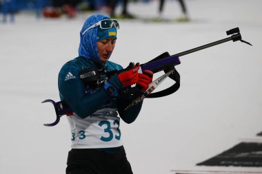 Pyeongchang, Güney Kore - 10 Şubat 2018: Vita Ukrayna Semerenko rekabet Biatlon içinde kadınlar'ın Olimpiyat şampiyonu 7.5km Sprint Alpensia Biatlon merkezinde 2018 Kış Olimpiyatları