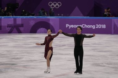 Tarihleri, Güney Kore - 12 Şubat 2018: İki kez Olimpiyat Şampiyonu takım olay buz dansı serbest dansı 2018 Kış Olimpiyat Oyunları'nda Tessa Virtue ve Scott Moir Kanada gerçekleştirilebileceğinizi
