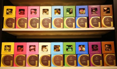 NEW YORK - DECEMBER 6, 2018: Chocolate boxes in Godiva store in Macy's Herald Square in Manhattan. Godiva Chocolatier is a manufacturer of premium chocolates founded in Belgium in 1926. clipart