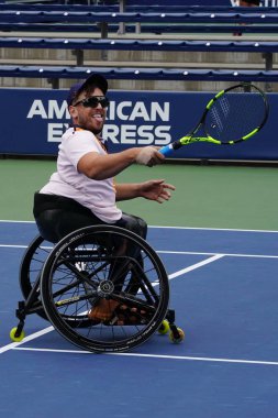 NEW YORK - SEPTEMBER 8, 2018: Wheelchair tennis player Dylan Alcott of Australia celebrates victory after his Wheelchair Quad Singles semifinal match at the 2018 US Open at USTA National Tennis Center
