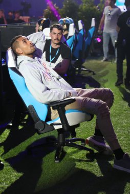 Melbourne, Avustralya - 27 Ocak 2019: Profesyonel tenis oyuncusu Nick Kyrgios eklem yüzlerce Fortnite oyun sırasında Fortnite yaz Smash Melbourne Avustralya Açık 2019, rekabet