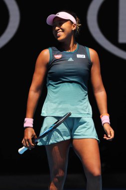 Melbourne, Avustralya - 23 Ocak 2019: Grand Slam şampiyonu Naomi Osaka Japonya'nın sonra onun çeyrek final maçında 2019 Avustralya Açık Melbourne Park zafer kutluyor