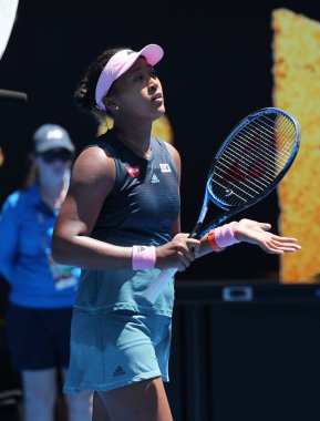 Melbourne, Avustralya - 21 Ocak 2019: Grand Slam şampiyonu Naomi Osaka Japonya'nın sonra onun yuvarlak 2019 Avustralya Açık Melbourne Park 16 maçın zafer kutluyor