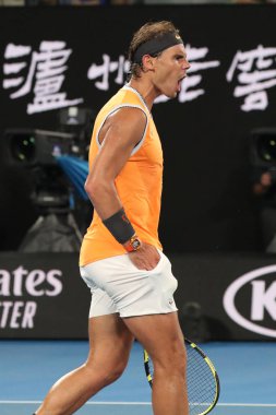 Melbourne, Avustralya - 24 Ocak 2019: on yedi kez Grand Slam şampiyonu İspanya Rafael Nadal kutluyor zafer 2019 Avustralya Açık Melbourne Park onun yarı final maçı sonrası
