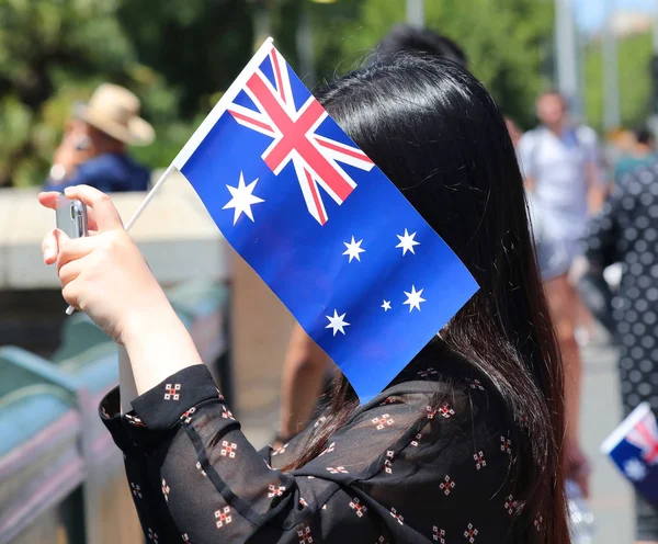 Unidentified woman celebrates Australia on Australia Day at the Kings Domain Gardens in Melbourne