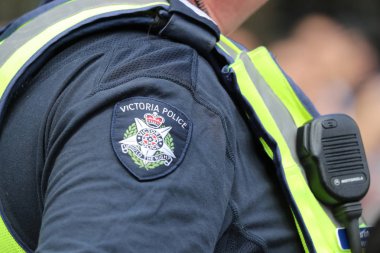 Melbourne, Avustralya - 26 Ocak 2019: Victoria polis omuz yama. Victoria Emniyet Müdürlüğü Melbourne 2019 Avustralya günü yürüyüşü sırasında güvenlik sağlar 