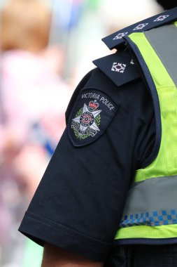 Melbourne, Avustralya - 26 Ocak 2019: Victoria polis omuz yama. Victoria Emniyet Müdürlüğü Melbourne 2019 Avustralya günü yürüyüşü sırasında güvenlik sağlar 