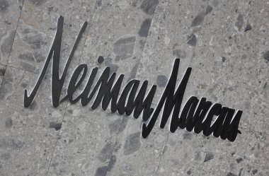 NEW YORK - MARCH 19, 2019: Neiman Marcus sign. Neiman Marcus opens first Manhattan store at the Shops at Hudson Yards shopping mall.  clipart