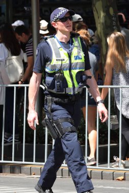 MELBOURNE, AUSTRALYA - 26 Ocak 2019: Victoria Polis Memuru Melbourne 'da 2019 Avustralya Günü Geçit Töreni sırasında güvenlik sağlıyor