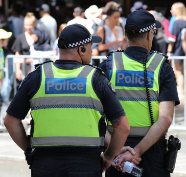 MELBOURNE, AUSTRALYA - 26 Ocak 2019: Victoria Polis Memuru Melbourne 'da 2019 Avustralya Günü Geçit Töreni sırasında güvenlik sağlıyor