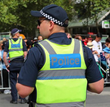 MELBOURNE, AUSTRALYA - 26 Ocak 2019: Victoria Polis Memuru Melbourne 'da 2019 Avustralya Günü Geçit Töreni sırasında güvenlik sağlıyor