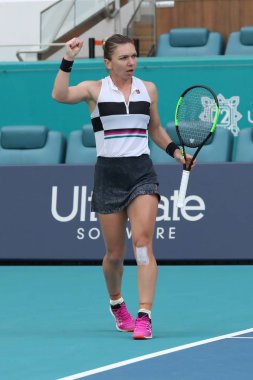 MIAMI GARDENS, FLORIDA - MARCH 27, 2019: Grand Slam Champion Simona Halep of Romania in action during her quarter-final match at 2019 Miami Open at the Hard Rock Stadium in Miami Gardens, Florida