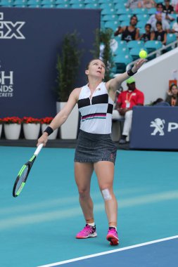 MIAMI GARDENS, FLORIDA - MARCH 27, 2019: Grand Slam Champion Simona Halep of Romania in action during her quarter-final match at 2019 Miami Open at the Hard Rock Stadium in Miami Gardens, Florida
