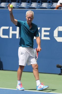 NEW YORK - AUGUST 22, 2018: Seven times Grand Slam Champion John McEnroe in action during 2018 US Open exhibition match at newly open Louis Armstrong Stadium at Billie Jean King National Tennis Center