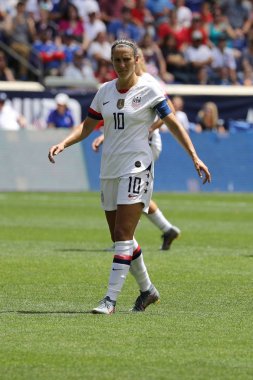 HARRISON, NJ - MAY 26, 2019: U.S. Women's National Soccer Team captain Carli Lloyd #10 in action during friendly game against Mexico as preparation for 2019 Women's World Cup on Red Bull Arena  clipart