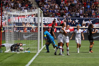 HARRISON, NJ - MAY 26, 2019: U.S. Women's National Soccer Team forward Mallory Pugh #2 scores goal during friendly game against Mexico as preparation for 2019 Women's World Cup in Harrison, NJ clipart