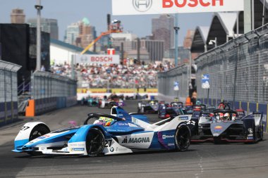 NEW YORK - JULY 14, 2019: British professional racing driver Alexander Sims of  BMW Andretti Team driving his Formula E car (27) during 2019 New York City E-Prix round 13 at Red Hook in Brooklyn clipart