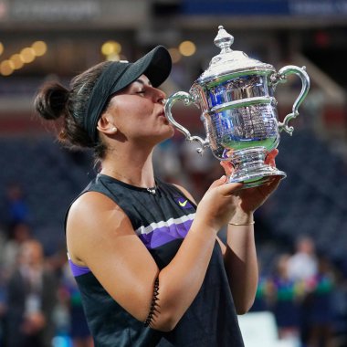 NEW YORK - SEPTEMBER 7, 2019: 2019 US Open champion  Bianca Andreescu of Canada during trophy presentation after her victory over Serena Williams at Billie Jean King National Tennis Center in New York clipart