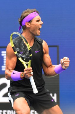 NEW YORK - SEPTEMBER 8, 2019: US Open 2019 champion Rafael Nadal of Spain in action during his final match against Daniil Medvedev of Russia at Billie Jean King National Tennis Center in New York clipart