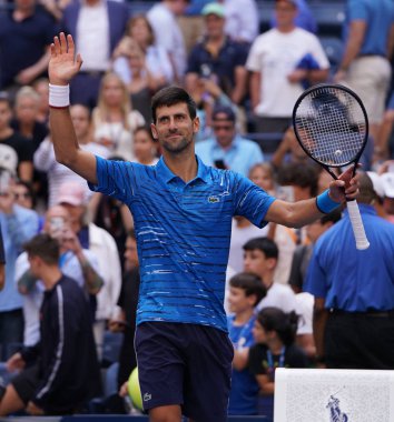 New York - 26 Ağustos 2019: Sırbistan Grand Slam Şampiyonu Novak Cokoviç, New York 'taki Billie Jean King Ulusal Tenis Merkezi' nde oynanan 2019 US Open ilk tur karşılaşmasının zaferini kutladı