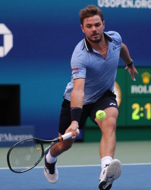New York - 3 Eylül 2019: İsviçre Grand Slam Şampiyonu Stanislas Wawrinka, New York 'taki Billie Jean King Ulusal Tenis Merkezi' nde oynanan 2019 US Open çeyrek final karşılaşmasında