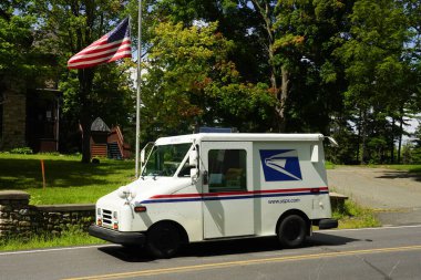 AUSABLE CHASM, NEW YORK - AUGUST 22, 2020: United States Postal Service truck in upstate New York clipart
