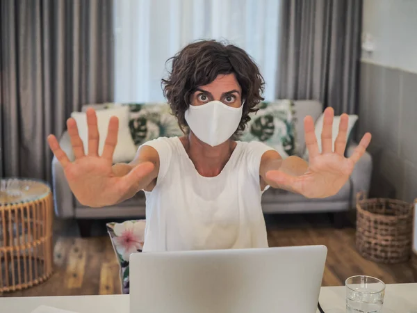 woman with laptop working at home, home office and quarantine concept