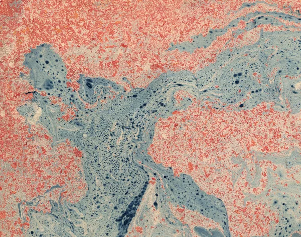 Kağıt üzerinde boya lekesi. Su sıçramalarına ve noktalar boya doku. Ebru - antik teknik çizim oryantal. Kaotik soyut organik tasarım. Marbleized.