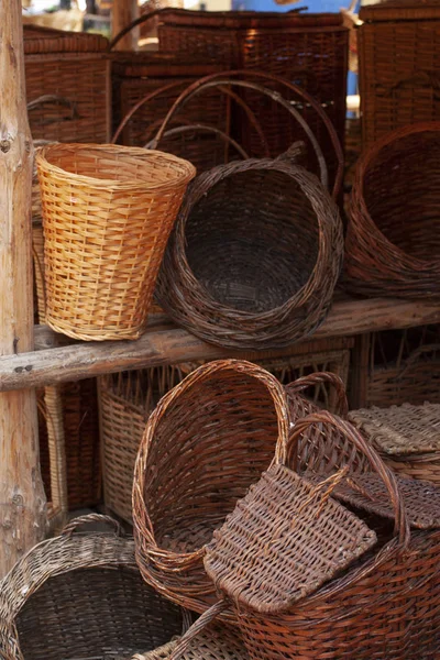 Oriental bazaar. Exhibits ancient times. Wicker baskets of vines and willow twigs.