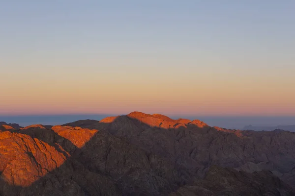 Egypt. Mount Sinai in the morning at sunrise. (Mount Horeb, Gabal Musa, Moses Mount). Pilgrimage place and famous touristic destination.