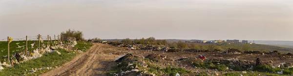 Environmental disaster. Clogging the outskirts of the city. Garbage heaps are an element of the modern European landscape.