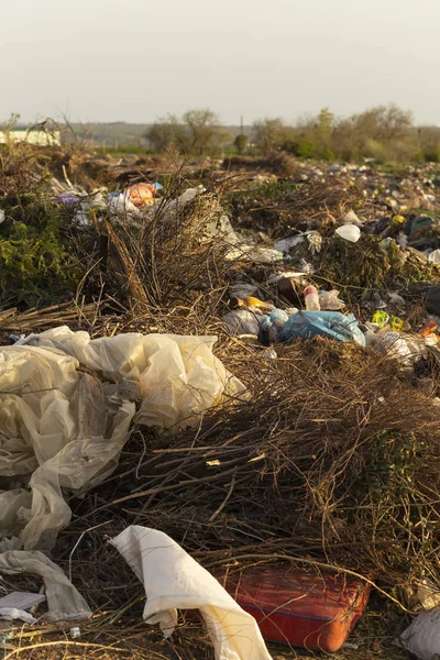 Environmental disaster. Clogging the outskirts of the city. Garbage heaps are an element of the modern European landscape.