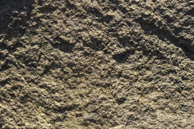 Kaya plakası. Renkli taş yüzey. Evin duvarı. Jeoloji ve Metamorfik kayaçlar.