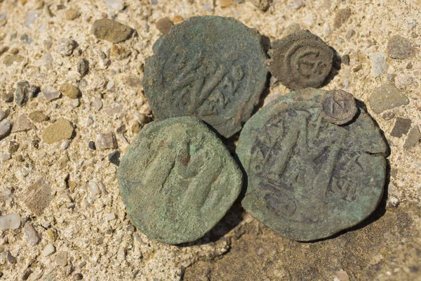 Byzantine copper coins from the reign of Emperor Justinian 1. Excavations of the winery in the ancient fortress of the 5th century in the town of Byala. Follis.