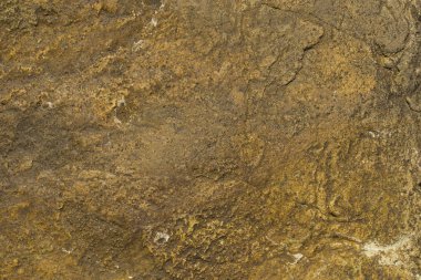 Kaya plakası. Renkli taş yüzey. Evin duvarı. Jeoloji ve Metamorfik kayaçlar.