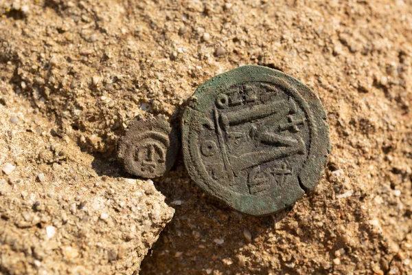 Byzantine copper coins from the reign of Emperor Justinian 1. Excavations of the winery in the ancient fortress of the 5th century in the town of Byala. Follis.