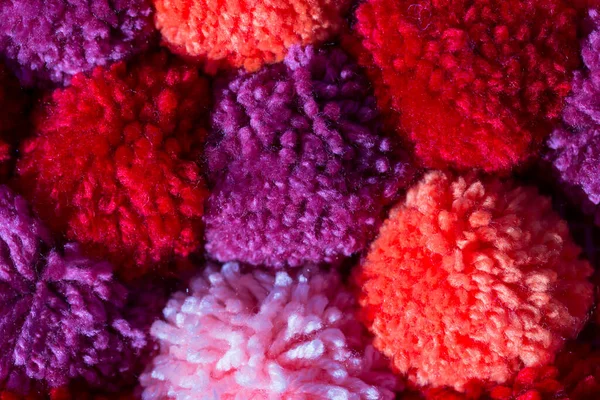 Kırmızı, pembe ve mor ponponların arka planı.