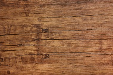 Ahşap arka plan. Doğal renk ve desenli eski ahşap dokunun yüzeyi. Yıpranmış eski ahşap çatallı masanın üst görüntüsü