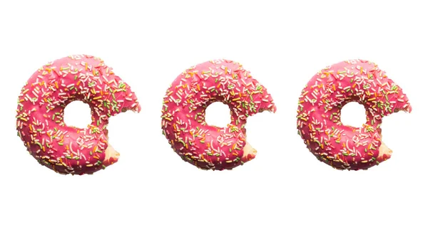Кусали Розовые Пончики Брызгами Светло Розовом Фоне Питание Сверху — стоковое фото