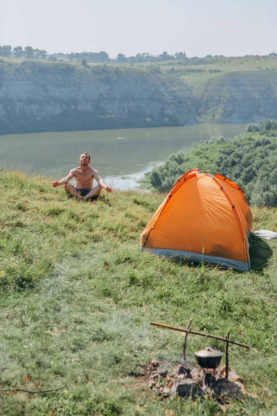 overnight family in a tent in the wild and dawn by the river with a beautiful scenery