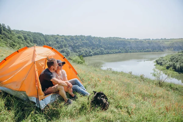 overnight family in a tent in the wild and dawn by the river with a beautiful scenery